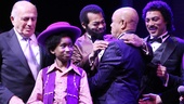 Producer Doug Morris joins Raymond Luke Jr., Brandon Victor Dixon, Berry Gordy and Charl Brown in the onstage celebration.