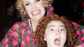 I love you, Miss Hannigan? Annie stars Jane Lynch and Lilla Crawford play around backstage after the show. 