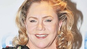 Kathleen Turner exchanges her neutral nun duds for something with a little more opening night style. 