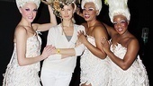 Looking good, Karolina! The model tries on a Priscilla headdress courtesy of the show’s Divas. We bet these girls had plenty to talk about thanks to the Diva’s winged costumes and Kurkova’s days as a Victoria's Secret Angel.