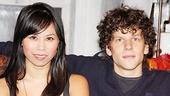 Jesse Eisenberg throws his arm around his onstage sister-in-law Camille Mana. 