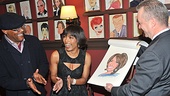 Free at last! Sardi's head honcho Max Klimavicius receives a standing ovation from Samuel L. Jackson and a delighted Angela Bassett as her carricature is unveiled.
