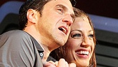 Raúl Esparza and Jessica Phillips hold each other close onstage on opening night of Leap of Faith.