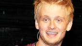 Anthony Fedorov lights up after his first off-Broadway performance as musician Roger in Rent. 