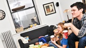 The duo heads back to Christy’s midtown apartment for some popcorn and home movies. (That’s their high school production of South Pacific on the TV screen!)