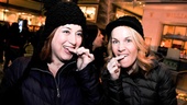 Smile, ladies! Once cast member Anne L. Nathan and A Christmas Story's Erin Dilly, who have been friends for more than a decade, check their teeth before posing for photos at the Christmas shops at Columbus Circle.