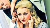 Betsy Wolfe gets a little help with her wig as she prepares to make her rap debut.