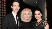 Cory Michael Smith and Emilia Clarke flank Blondie singer Debbie Harry, who hosted the evening’s black-and-white-themed bash.