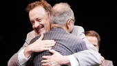 The newly minted Broadway star shares a congratulatory hug with director George C. Wolfe.