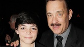 It’s a touching moment as Tom Hanks poses with Mike McAlary’s young son Quinn.