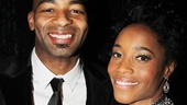 Leading duo Brandon Victor Dixon and Valisia LeKae show off a Motown record at the party.