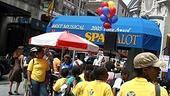 Photo Op - Spamalot at 1000 performances - crowd lines up ice cream stand