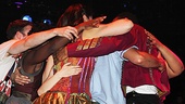After a stirring performance, the cast of Godspell circles Corbin for a group hug!