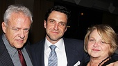Flanked by his proud parents, Raúl Esparza gives the camera a sweet grin.