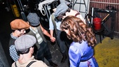 Seconds before the show begins at the Nederlander Theatre, Newsies cast members form a tight circle and look to the show ahead. Break a leg all! 