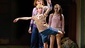 Ty Forhan as Billy Elliot, Leah Hocking as Mrs. Wilkinson and Annelise Ritacca as Ballet Girl in Billy Elliot.