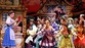 Hilary Maiberger as Belle and the cast of the national tour of Beauty and the Beast.